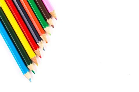 Colored pencils on white background Stock Photos