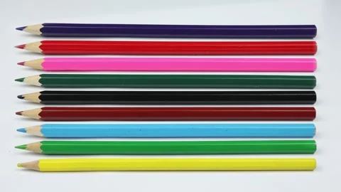 Colored pencils on a white background. Preparation for school, drawing lesson Stock Footage 232419424