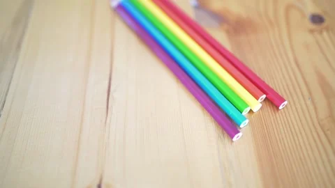 Colored pencils on a wooden table. Multi-colored equipment for children Stock Footage 148821787