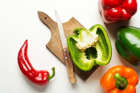 Colored Peppers vegetable on white. Stock Photos