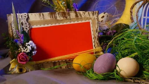 Colored Photo Frame, Easter Hen and Quail Eggs, a Bottle With a Lit Candle, a Stock Footage 72882908