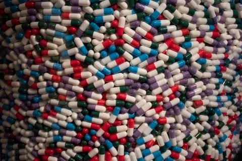 Colored pills one Stock Photos