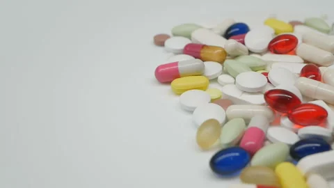 Colored pills rotating, from the right side, Close up Stock Footage 85742433