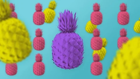 Colored pineapples, blue mint background, spinning colorful fruits, minimal, zin Stock Footage 102306189