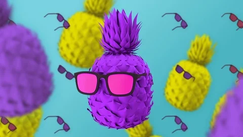 Colored pineapples in glasses, mint blue background, rotating colorful fruits Stock Footage 102528277