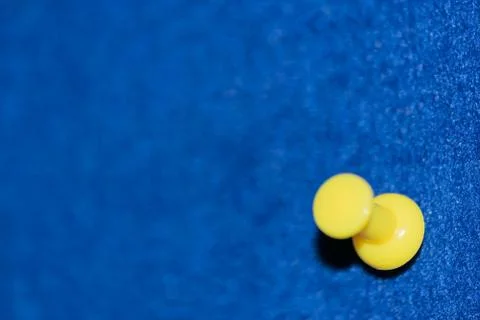Colored pins on a board Stock Photos