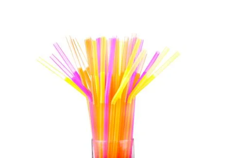 Colored plastic drinking straws on a white background Foto stock