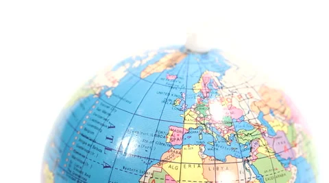 Colored plastic globe. Defocus on Northern Hemisphere / Europe. Blurred to sharp Stock Footage 60250381