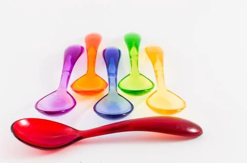 Colored plastic spoons Stock Photos