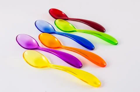 Colored plastic spoons Stock Photos