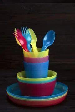 Colored plastic tableware Stock Photos