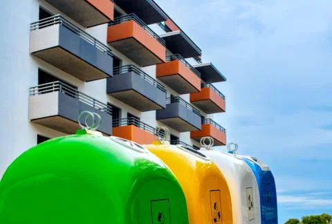 Colored plastic trash cans Stock Photos