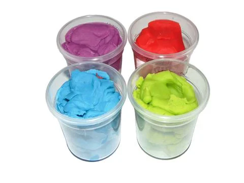 Colored plasticine isolated on white background 库存照片