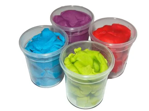 Colored plasticine isolated on white background Fotos de archivo