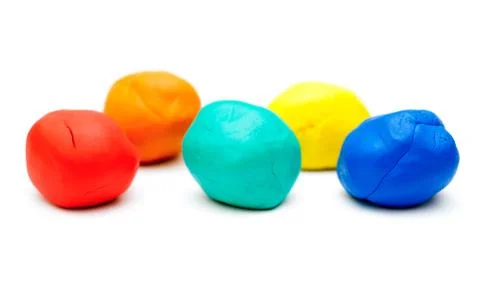 Colored plasticine on white background Stock Photos