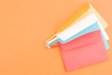 Colored postage envelopes with colored pencils. Foto stock