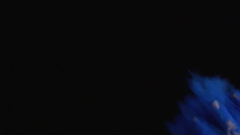 Colored Powder Is Exploded Against A Black Background Stock Footage 87477849