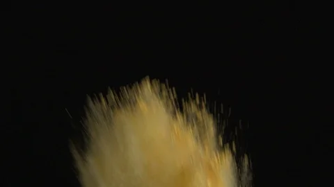Colored Powder Is Exploded Against A Black Background Stock Footage 87477885