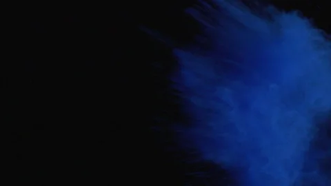 Colored Powder Is Exploded Against A Black Background Stock Footage 87478044