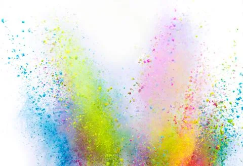 Colored powder explosion on white background. Stock Photos