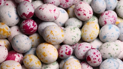 Colored quail chocolate eggs. Easter. Stock Footage 234696154