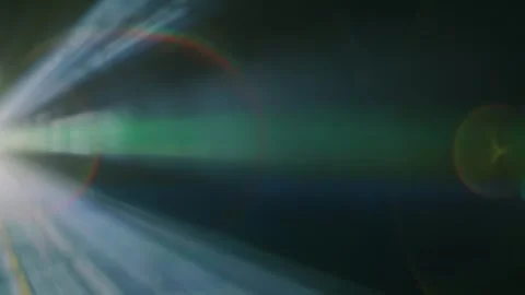 Colored rays emerge from the edge of the frame and move on a black background Stock Footage 313148146