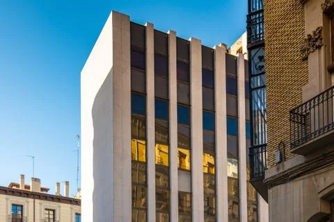 Colored reflections on the windows of the facade of a building Stock Photos