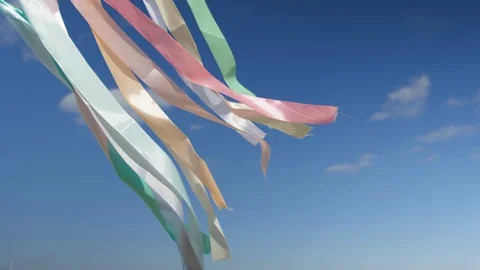 Colored ribbons on blue sky Stock-Footage 86510419