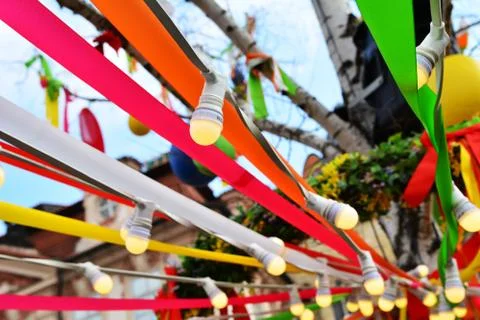 Colored ribbons with small lanterns Stock Photos