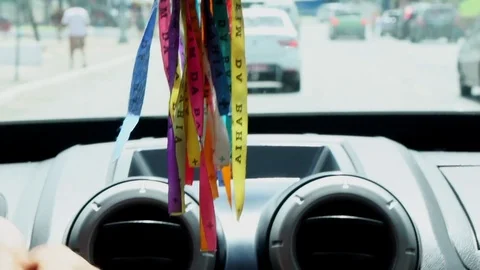 Colored ribbons tied inside the car, Salvador, Bahia, Brazil Stock Footage 80828028
