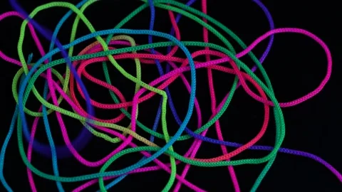 Colored rope on black background Stock Footage 149998907