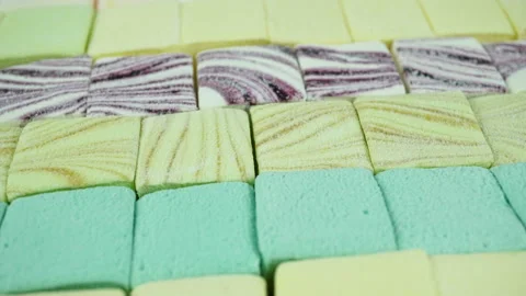 Colored Rotating Classic Marshmallow Top View. Video stock 229463187