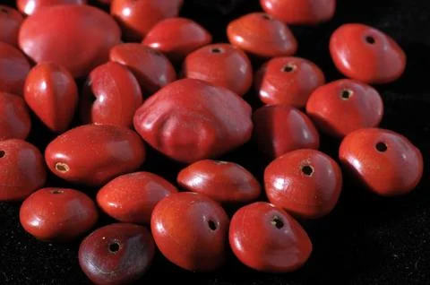 Colored round seeds ready to make handmade jewelry 스톡 사진