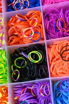 Colored rubber bands in compartments 写真素材