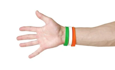 Colored rubber bracelets on the arm. Close up. Isolated on white background Stock-Fotos