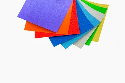 Colored samples of fabric on the background. place for text. top view Stock Photos