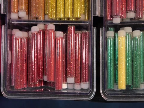 Colored sequinsin tubes for makeup. Shiny glitter on makeup. 動画素材 73397738