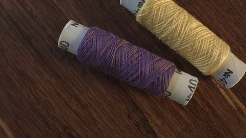Colored sewing threads on the table Vídeos de archivo 79530614