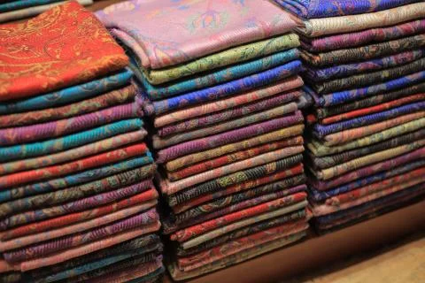Colored shawls at a market Stock Photos