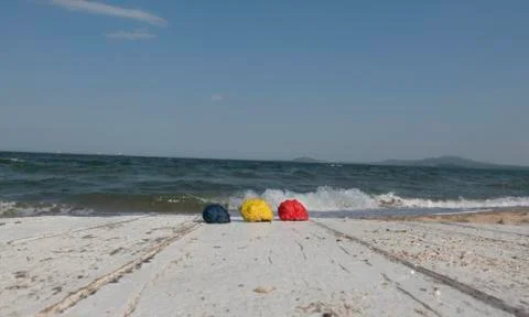 Colored shells on the shabby white table Stock Photos