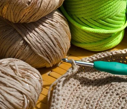 Colored skeins of thread for weaving macrame and boxes with accessories. Stock Photos