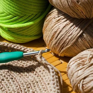 Colored skeins of thread for weaving macrame and boxes with accessories. Stock Photos