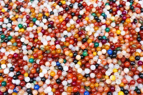 Colored small stones. Stock Photos