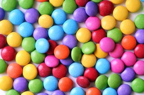 Colored smarties texture pattern Stock Photos