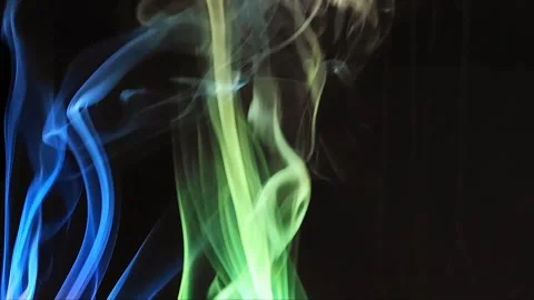 Colored smoke on abstract black background Stock Footage 293252340