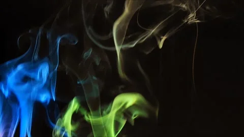 Colored smoke on abstract black background Stock Footage 293252347