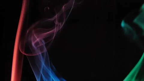Colored smoke on abstract black background Stock Footage 293252375