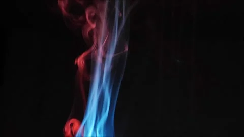 Colored smoke on abstract black background Stock Footage 293252392