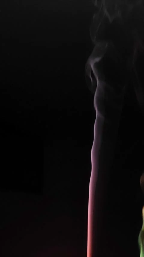 Colored smoke on abstract black background Stock Footage 293252409