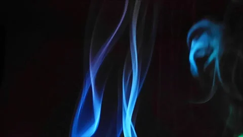 Colored smoke on abstract black background Stock Footage 293252414